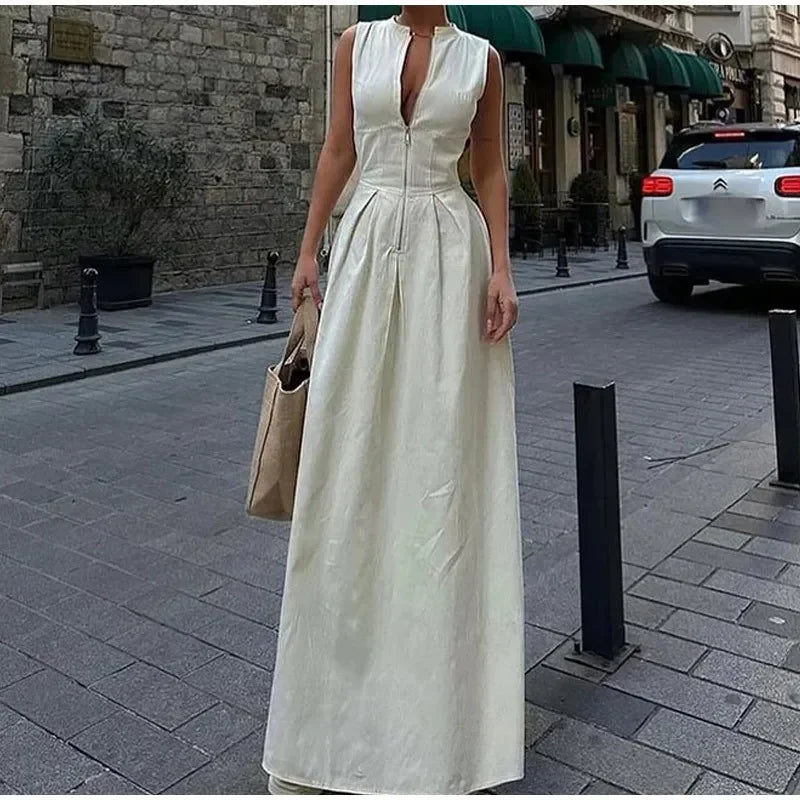 Jupe longue maxi plissée sans manches pour femme, collection été 2024, poches zippées sur le devant, coupe ajustée trapèze, ourlet large, style années 2000