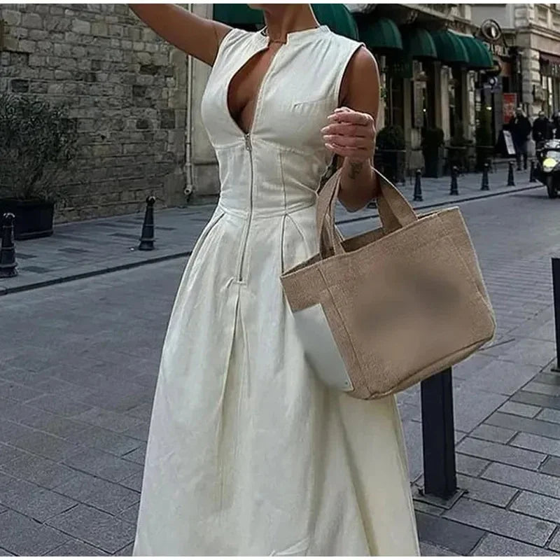 Jupe longue maxi plissée sans manches pour femme, collection été 2024, poches zippées sur le devant, coupe ajustée trapèze, ourlet large, style années 2000
